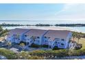Charming condo complex with private balconies and lush landscaping offers a relaxing coastal lifestyle at 6000 Boca Grande Cswy # D38, Boca Grande, FL 33921