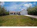 Charming single-story home with a well-manicured lawn, and inviting curb appeal at 6368 Pennell St, Englewood, FL 34224