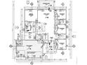 Detailed floor plan reveals a three-bedroom layout, highlighting the spacious design at 65 Pinehurst Ct, Rotonda West, FL 33947