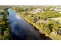 Stunning canal view with waterfront property, ideal for boating and peaceful living at 14246 Maysville, Port Charlotte, FL 33981
