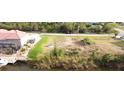 Waterfront lot on canal with seawall, perfect for boaters and water enthusiasts at 15342 Aron, Port Charlotte, FL 33981