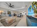 Open-concept living room featuring recessed lighting and a ceiling fan at 1607 Laurel Brook Ln, Port Charlotte, FL 33953