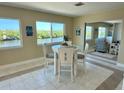 Bright dining area with waterfront views, perfect for enjoying meals with a scenic backdrop at 1490 Janet Pl, Englewood, FL 34223