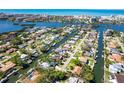This aerial view shows a waterfront neighborhood with direct access to the ocean at 1648 Shelburne Ln, Sarasota, FL 34231
