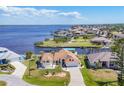 A beautiful single-Gathering home with a lush green lawn and access to water and boating at 2418 Herron Ter, Port Charlotte, FL 33981
