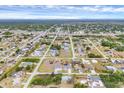 Community aerial view showcasing a well-planned neighborhood layout with easy highway access at 10060 Amelia Ave, Englewood, FL 34224