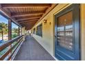 Exterior view of a hallway with a door numbered nine at 11 Quails Run Blvd # 9, Englewood, FL 34223