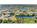 This home is on the canal, in a charming community with nearby conveniences at 1278 Lincoln Dr, Englewood, FL 34224