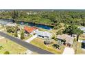 This property is situated on a canal with a backyard dock to enjoy the beauty of the water at 1278 Lincoln Dr, Englewood, FL 34224