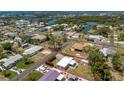 Aerial view of the property showcasing its location near waterways and the surrounding neighborhood at 1530 Philip Pl, Englewood, FL 34223