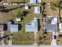 A bird's eye view showcases the property layout and backyard space at 350 W Cowles St, Englewood, FL 34223