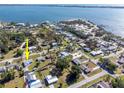 A distant aerial shot shows the property's location near the water at 350 W Cowles St, Englewood, FL 34223