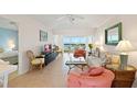 Comfortable living area with large windows and waterfront views that create a relaxing atmosphere at 5856 Gasparilla Rd # Mv26, Boca Grande, FL 33921