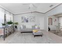 Comfortable living room with neutral tones, stylish furnishings, and ample natural light at 13100 S Mccall Rd # 112, Port Charlotte, FL 33981