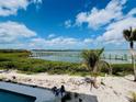 Expansive water views of the marina and channel at 1400 Beach Rd # 2, Englewood, FL 34223