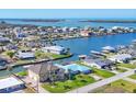 Waterfront community showcasing stunning home with easy water access to the bay for recreational activities at 1953 Georgia Ave, Englewood, FL 34224