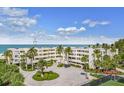This inviting building features lush landscaping, a circular drive, and is steps from the Gulf at 5700 Gulf Shores Dr # A312, Boca Grande, FL 33921