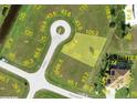 Aerial view highlighting the property lot, neighboring streets, and proximity to nearby amenities at 17456 Belie Way, Punta Gorda, FL 33955