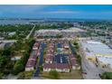 Stunning aerial image displays the community, nearby shopping centers and beautiful waterfront view at 1531 Placida Rd # 4-103, Englewood, FL 34223