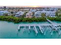 Beautiful waterfront property with private dock, featuring boat lift, in a serene coastal setting at 16716 Grande Quay Dr, Boca Grande, FL 33921