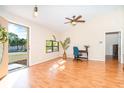 Bright entryway featuring wood-look flooring, a decorative window, and plenty of natural light at 3593 Birmingham Ln, North Port, FL 34288