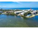 Beautiful aerial view of the property with waterfront views and neighborhood at 2700 N Beach Rd # A201, Englewood, FL 34223