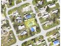 Aerial view of the property showcasing its location within a neighborhood at 3170 Smith St, Englewood, FL 34224