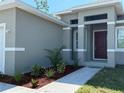 Charming single-story home with well-manicured landscaping at 18043 Hillsborough Blvd, Port Charlotte, FL 33954