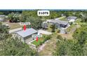 Spacious property featuring a large garage, putting green, and an inviting pool area perfect for relaxation and entertainment at 4510 Burns Ter, Port Charlotte, FL 33981