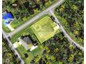 Aerial view of home on oversized lot in a quiet neighborhood at 15417 Hanley Ct, Port Charlotte, FL 33953