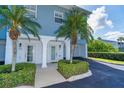 Up close exterior view featuring lush landscaping and private entrances to unit 101 and 102 at 3929 Cape Haze Dr # 101, Rotonda West, FL 33947