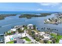 Gorgeous aerial shot of waterfront property surrounded by serene waterways and tropical foliage at 565 Green Dolphin S Dr, Placida, FL 33946