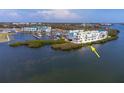 Beautiful waterfront condo complex with balconies overlooking the pristine water and marina at 8005 Bay Pointe Dr, Englewood, FL 34224