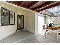 Outdoor patio with tile floor and outdoor dining set at 1640 Atares # 23, Punta Gorda, FL 33950