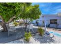 Cozy patio area with hammock and outdoor seating at 70 Wilhelm Dr, Englewood, FL 34223