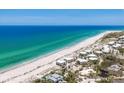 Breathtaking aerial view showcasing the location of the property on the beach at 7554 Palm Island S Dr # 1813, Placida, FL 33946