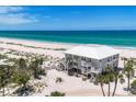 Gorgeous beachfront property with palm trees and access to pristine white sands and turquoise waters at 7554 Palm Island S Dr # 1813, Placida, FL 33946