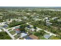 A quaint neighborhood featuring lovely single-Gathering homes surrounded by trees at 7104 Castilla St, Port Charlotte, FL 33981