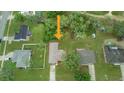 Aerial view of the property, showcasing its location within a serene neighborhood and spacious lot at 3143 Grayton Dr, Spring Hill, FL 34609