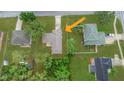 Birds eye view of the house, showing the roof and landscaping from above at 3143 Grayton Dr, Spring Hill, FL 34609
