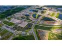 Drone view of a developing community with numerous retention ponds and newly constructed homes at 7490 Sea Manatee St, Parrish, FL 34219