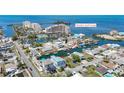 An aerial view of a waterfront property with access to the Gulf Coast waterways and surrounding neighborhood at 13737 Victor Ave, Hudson, FL 34667