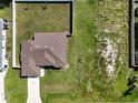 An aerial view of a charming single Gathering home featuring a well-maintained landscape at 4154 Duluth Ter, North Port, FL 34286
