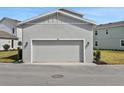 Spacious detached garage with a clean, modern design and ample parking space at 200 Eagleston Ln, Lakewood Ranch, FL 34240
