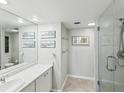 The bathroom offers a walk-in shower, a large mirror, vanity, and ample space at 1400 Gulf Blvd # 701, Clearwater Beach, FL 33767
