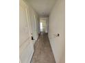 Hallway leading into a home with uninstalled electrical work at 1544 Blue Bayou Cir, Ruskin, FL 33570