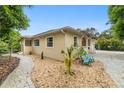 House exterior with landscaping and walkway at 1701 38Th Ave, St Petersburg, FL 33713