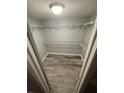 Walk-in closet with wire shelving, perfect for organized storage at 6019 W Fern St, Tampa, FL 33634
