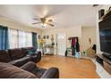 Living room with hardwood floors and ample natural light at 4414 E Sligh Ave, Tampa, FL 33610