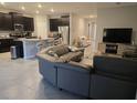 Open concept living room with kitchen view at 16988 Oval Rum Dr, Wimauma, FL 33598